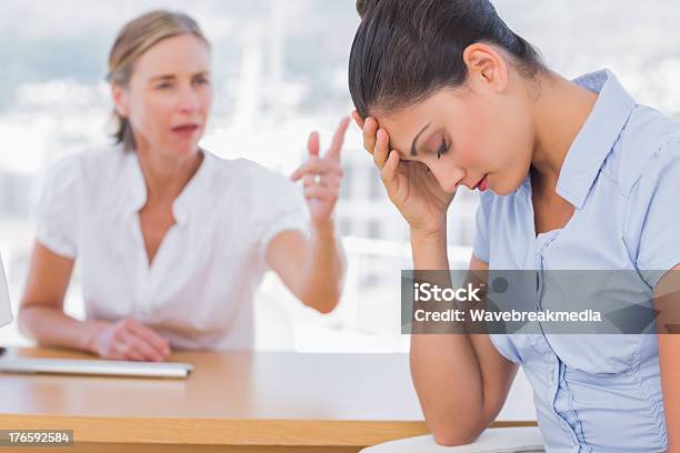 Businesswoman Arguing With A Colleague Stock Photo - Download Image Now - Blond Hair, Brown Hair, Business