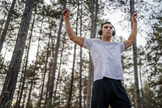 istock one man male athlete stretch in nature 1765947074