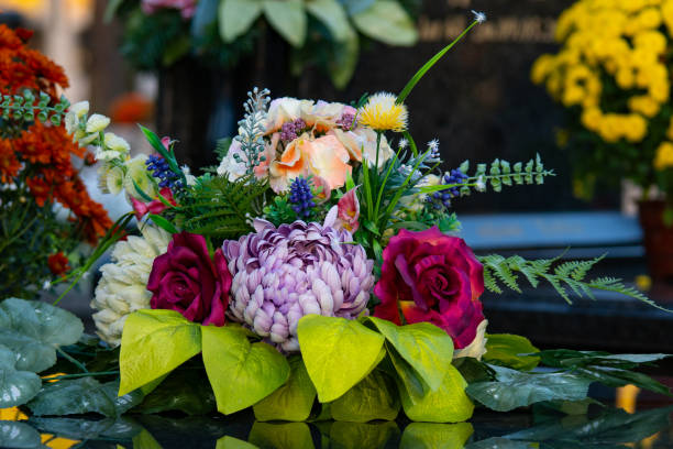 istock Flowers on the grave 1765949806