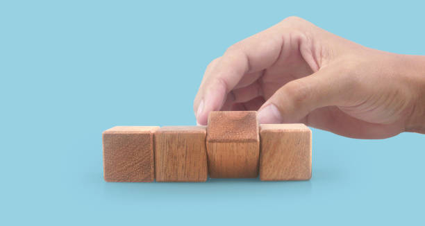 istock Wooden cubes in hand with copy space for input wording and infographic 1765950871