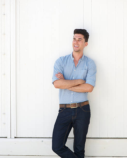 istock Attractive young man relaxing outdoors against white background 176595108