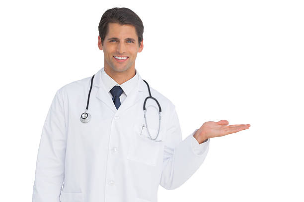 istock Happy doctor showing something and smiling 176595429