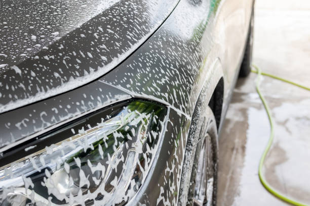 istock car cleaning and washing with foam soap 1765960983