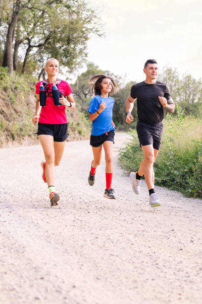 istock family practicing trail running in the countryside 1765964313