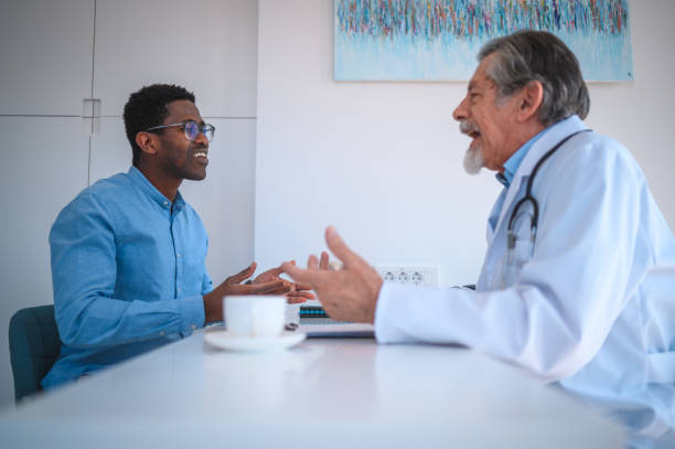 istock Mid Adult African American Man On An Regular Health Check With A General Practitioner 1765977407