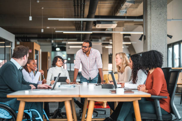 istock Group Of People From Various Ethnic Backgrounds Gathered For A Daytime Meeting 1765977757