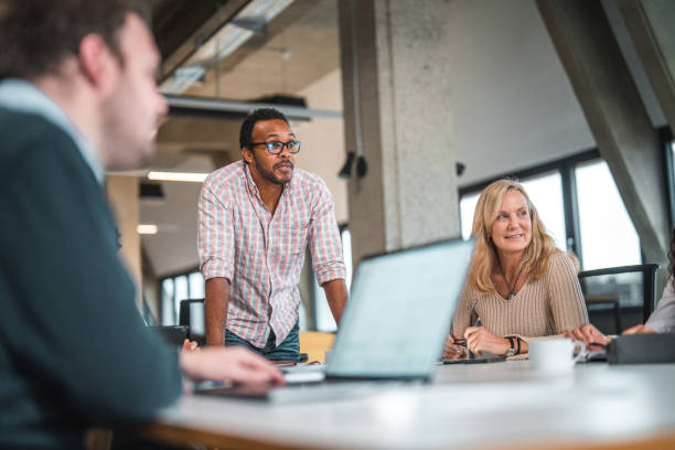 istock Low Angle Shot of Diverse Business People During a Work Meeting 1765977763