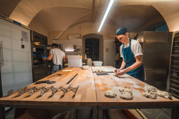 istock Artisan Bakers Creating Super Tasty Pastries In A Small Bakery 1765978885
