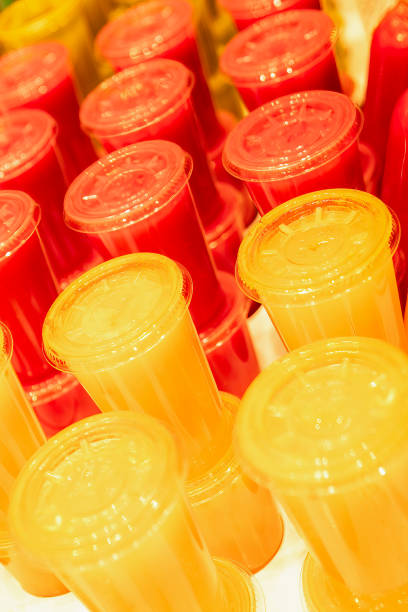 istock Glasses with juice in a row 1765996194