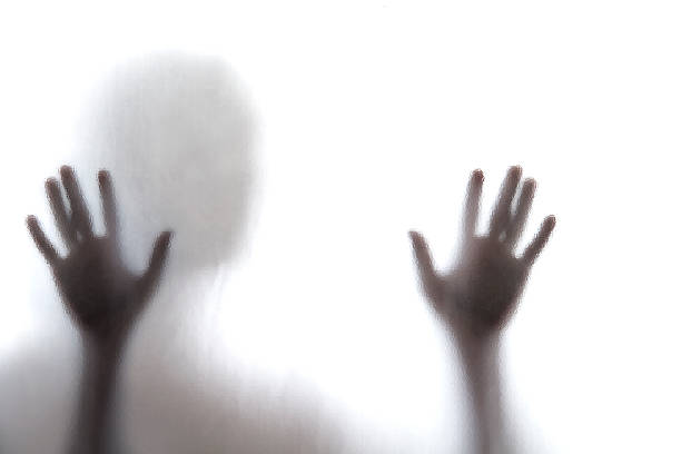 istock Man standing behind frosted glass 176603518