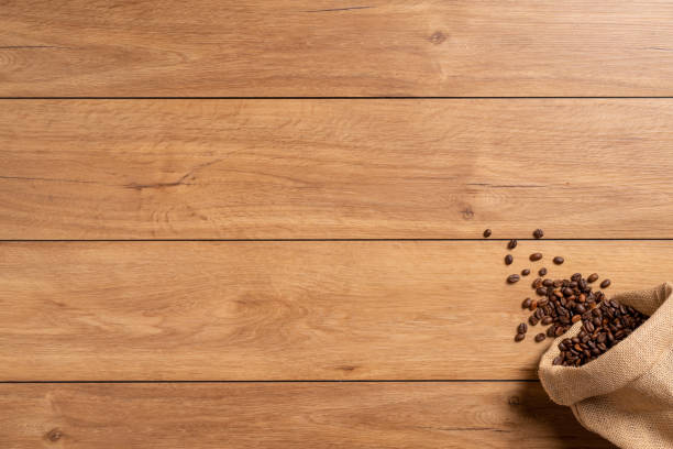 istock The many coffee beans on a wooden table 1766042971