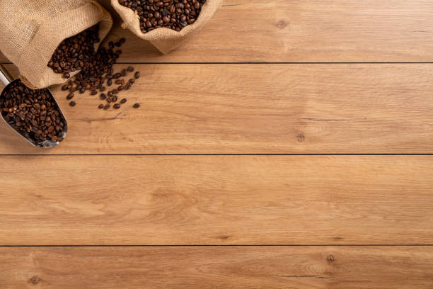 istock The many coffee beans on a wooden table 1766042975