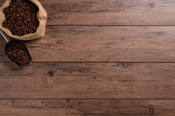 istock The many coffee beans on a wooden table 1766043536