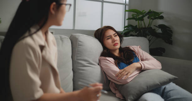 istock Asian woman discusses struggles during counseling 1766045940