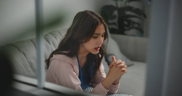 istock Asian woman discusses struggles during counseling 1766047038