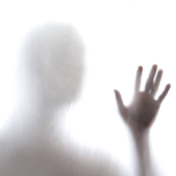 istock Man standing behind frosted glass 176607194