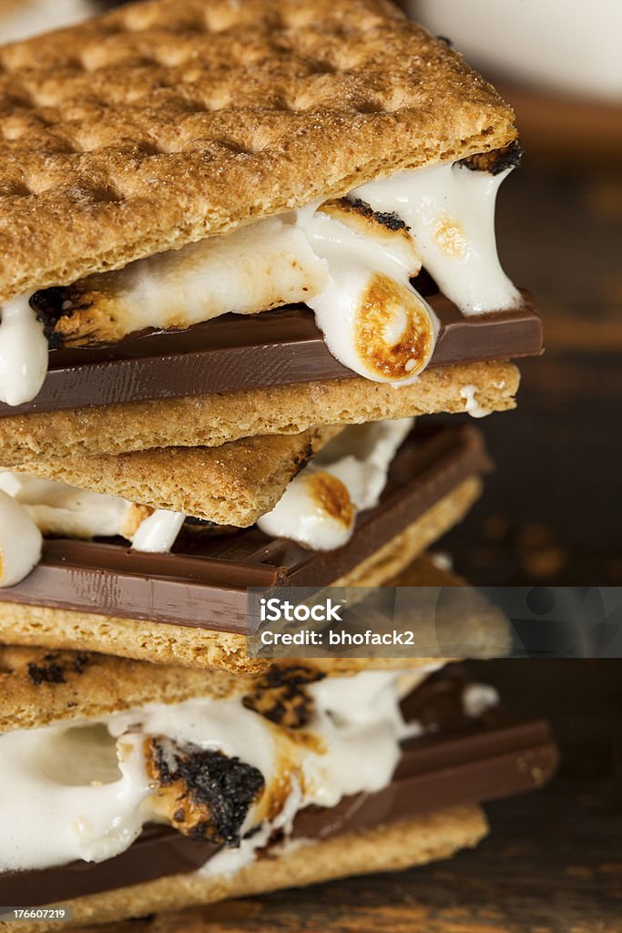 Homemade S'more with chocolate and marshmallow Homemade S'more with chocolate and marshmallow on a graham cracker Smore Stock Photo