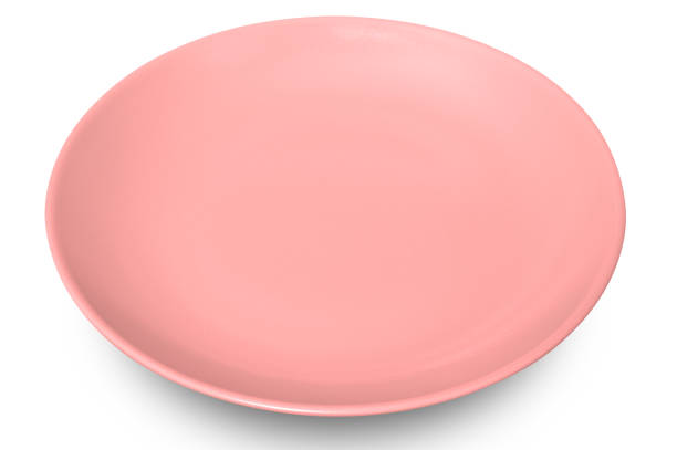 istock Pink circle ceramics plate isolated on white background. 1766101919