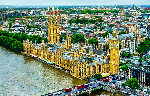 Aerial view of Westminster Palace, Westminster Bridge, Big Ben and Thames River in London, England