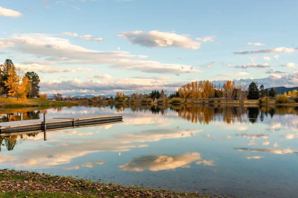 istock Beautiful autumn lake with mirror reflection 1766137565