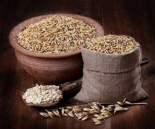 istock Oats and oat flakes on the table 176615529