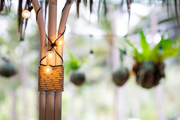 istock Vintage orange lights mounted on a white iron column with blurred background. 1766159155