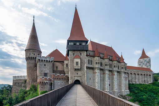 October 30, 2023: Hunedoara, Romania - Corvin Castle, also known as Castelul Corvinilor. This photo taken from the exterior and shows the majestic and large castle.