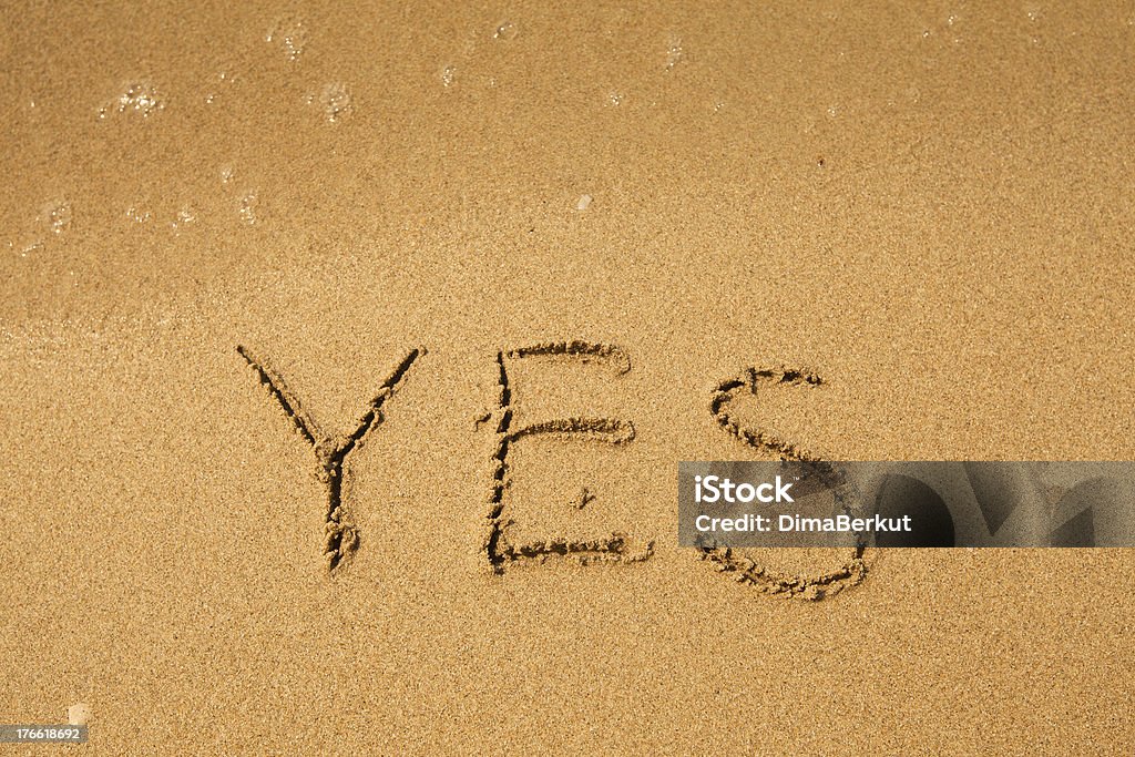 Ja – schriftliche im sand am Strand Struktur - Lizenzfrei Berühren Stock-Foto