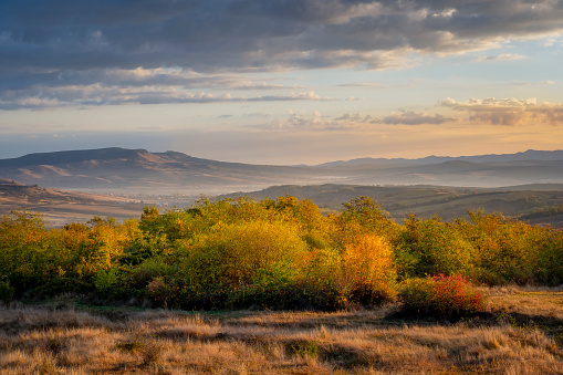 Golden hour landscape over the hills during the autumn