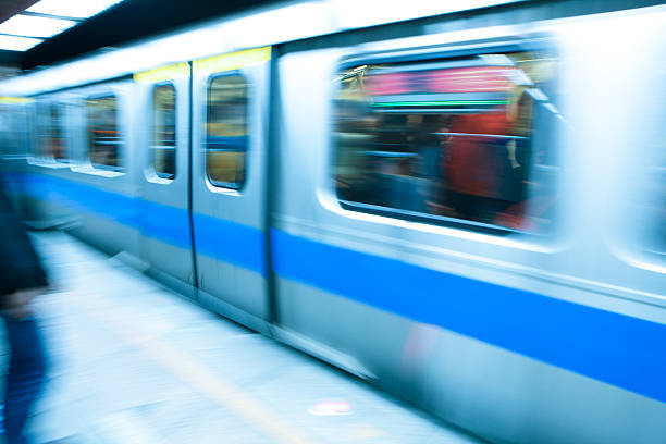 istock metro train travels at high speed 176621198