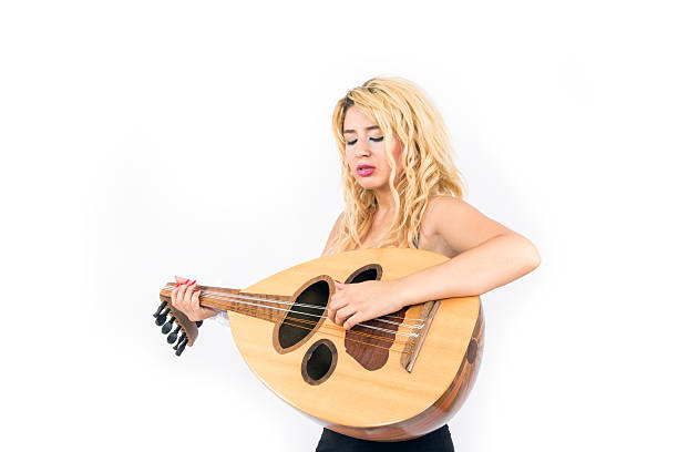 istock woman playing the lute 176621361