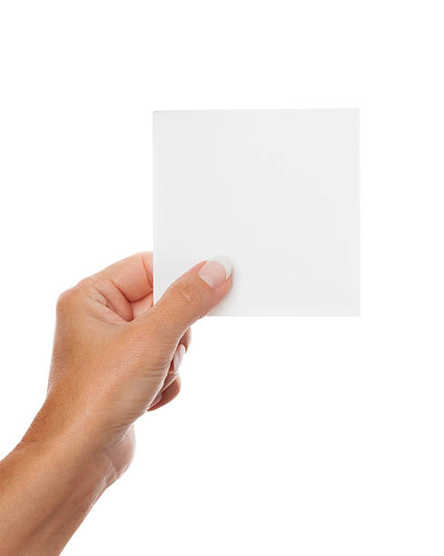 istock Blanc note in woman hand on white 176621400