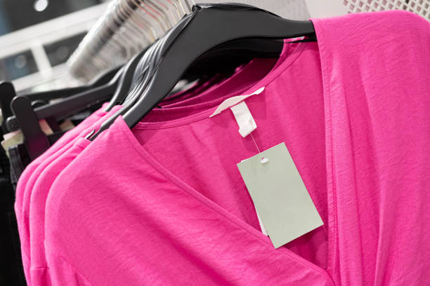 istock blank tag with Clothes hang on a shelf 1766240330