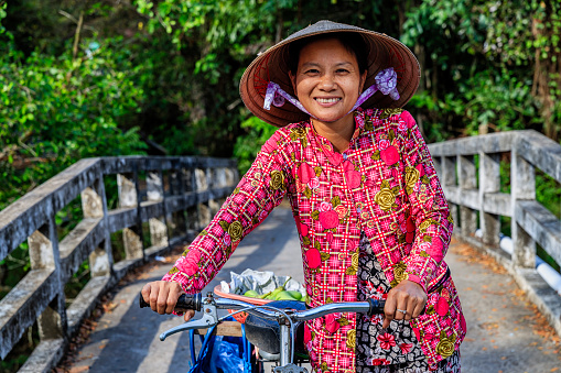Portrait of Vietnamese woman, Mekong River Delta, Vietnam