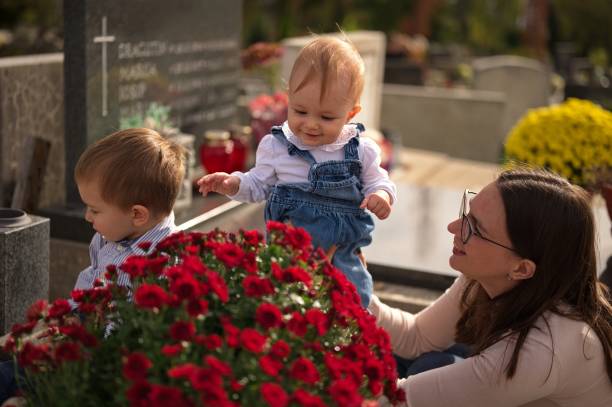 Mourning statue of Mother and child - old cemetery at Krasna Lipa, Czech republic, Europe