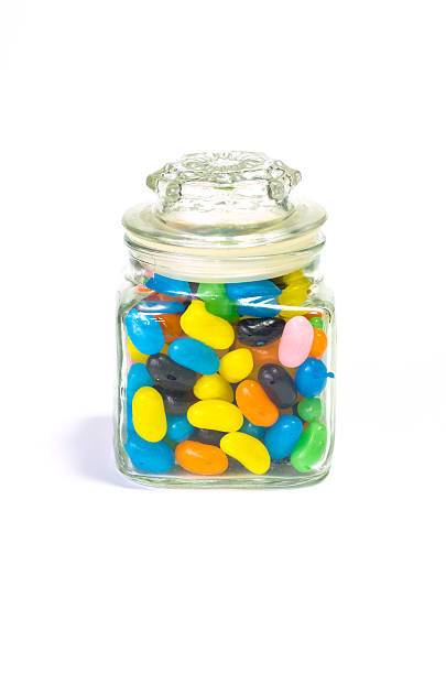 istock Jelly beans sugar candy snack in a jar isolated 176627726