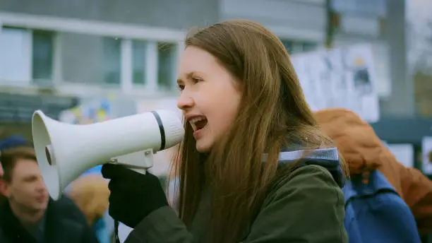 Photo of Young adult at demonstration