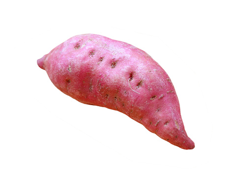 Closeup of a Raw Sweet Potato Isolated on white background