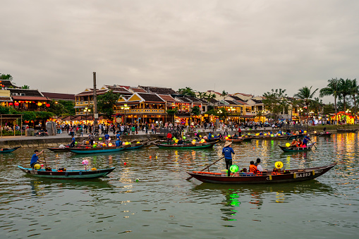 Hoi An, Vietnam - Jan 10, 2023; Tourist boat on the river at Hoi an The historic old town UNESCO World Heritage Site in Vietnam