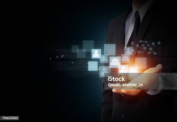 Male Hand Holding Virtual Icon Of Social Media Stock Photo - Download Image Now - Support, Corporate Business, Internet