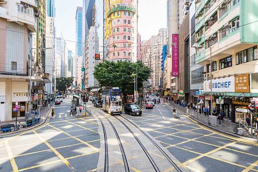 Hong Kong - February 28, 2023: Public transportation with Classic style of double-deck tram at Central District in Hong Kong