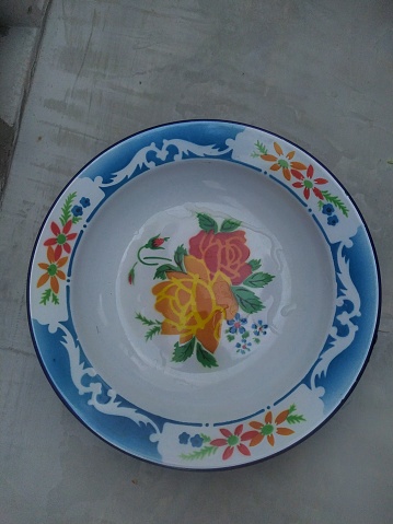 Place Setting with Majolica Plate and Yellow Napkin