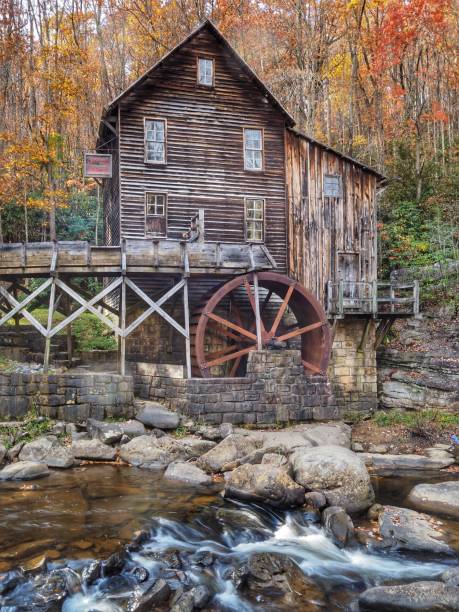 западная вирджиния grist mill - autumn watermill glade creek waterfall стоковые фото и изображения