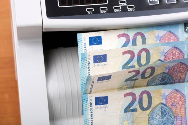 istock European money in a counting machine 1766450082