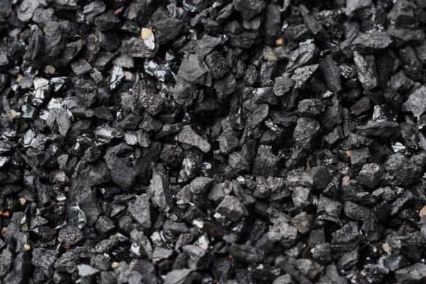istock The black coals were piled together. 1766455841