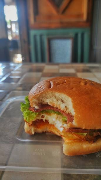 istock Beef burgers stuffed with beef, lettuce, and cheese 1766465067