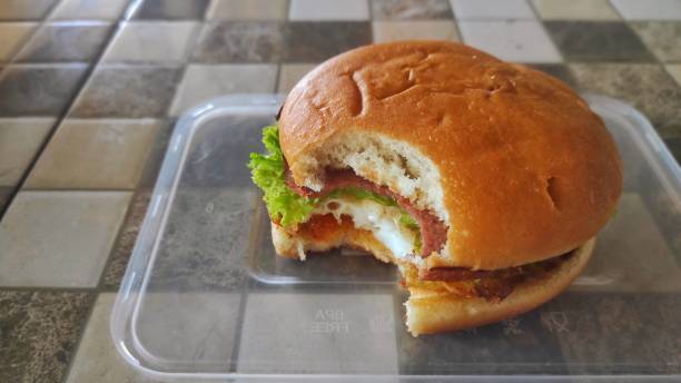 istock Beef burgers stuffed with beef, lettuce, and cheese 1766465591
