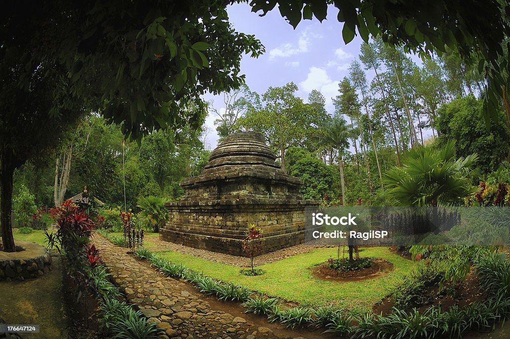 View of Sumberawan Temple beside garden Taken at Sumberawan Temple, Malang, east Java, Indonesia Ancient Stock Photo