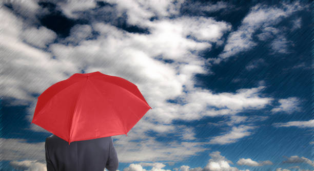 istock Leader holding red umbrella for show different think 176647434
