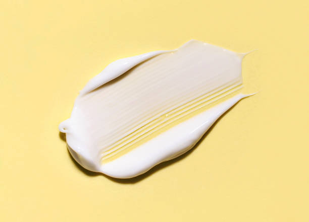 istock composition of cosmetic smears cream texture on pastel background 1766492448